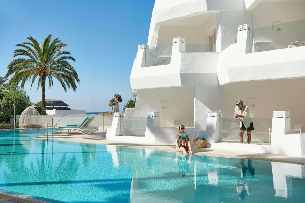 Swim-up rooms and outdoor pool at Iberostar Selection Marbella Coral Beach