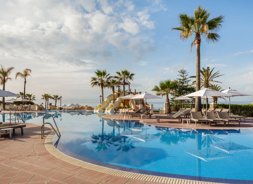 Marriott's Marbella Beach Resort outdoor pool with water slides and sun loungers