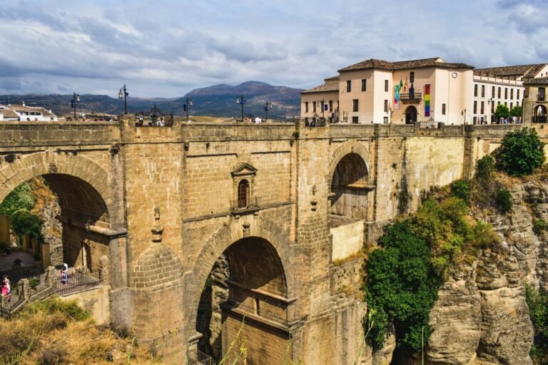 Panoramic view of the historic Puente Nuevo bridge in Ronda for a day trip from Marbella