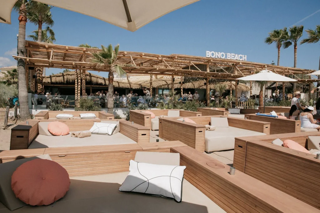 Bono Beach Marbella wooden sunbeds and open-air seaside restaurant terrace in El Rosario