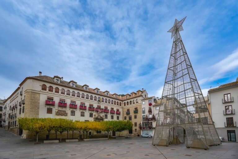 Christmas star decorations lighting up a square in Andalusia