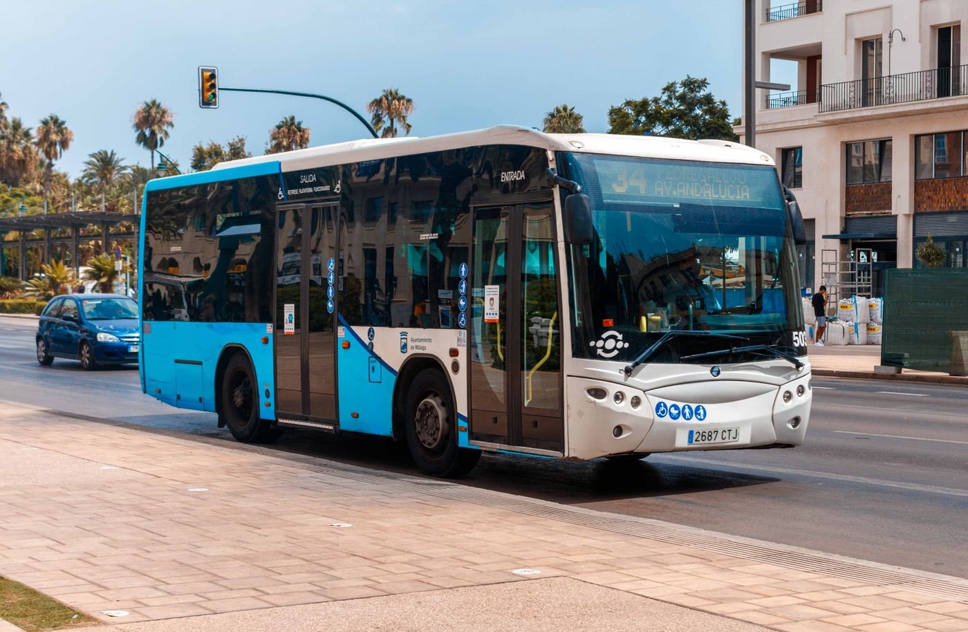 Public bus on a sunny street in Málaga