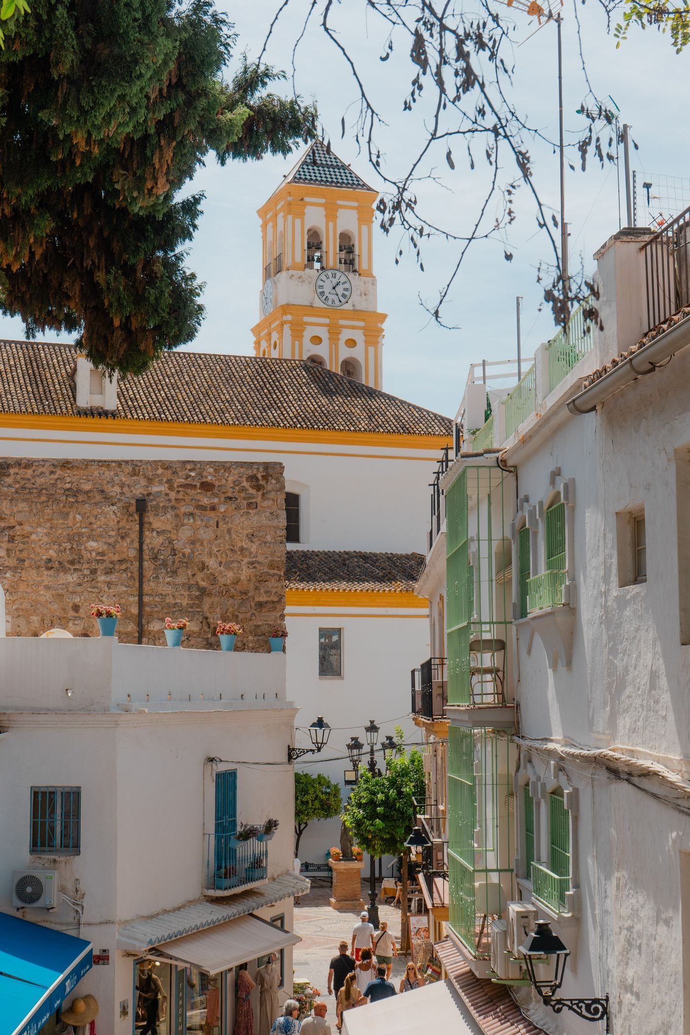 Whitewashed streets and clock tower in Marbella Old Town