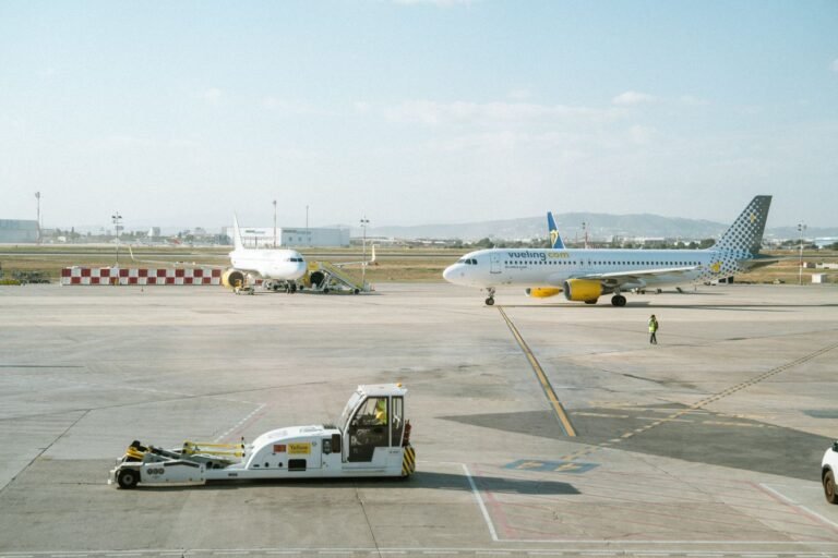 Passenger plane taxiing on an airport runway in Spain