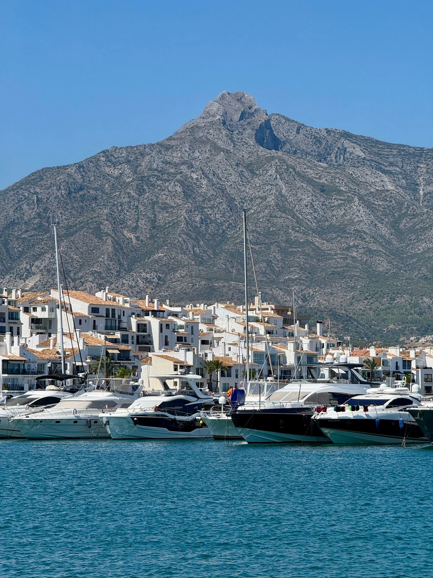 Yachts in Puerto Banús with La Concha mountain behind