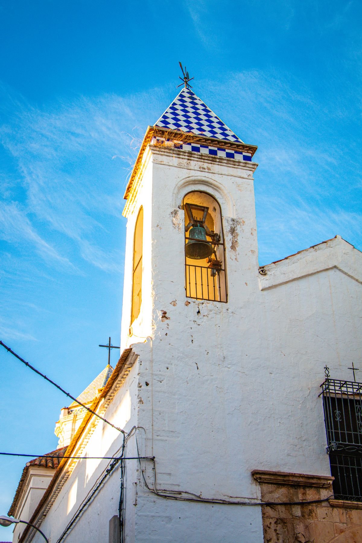 Tiled bell tower of the Ermita del Santo Cristo in Marbella Old Town