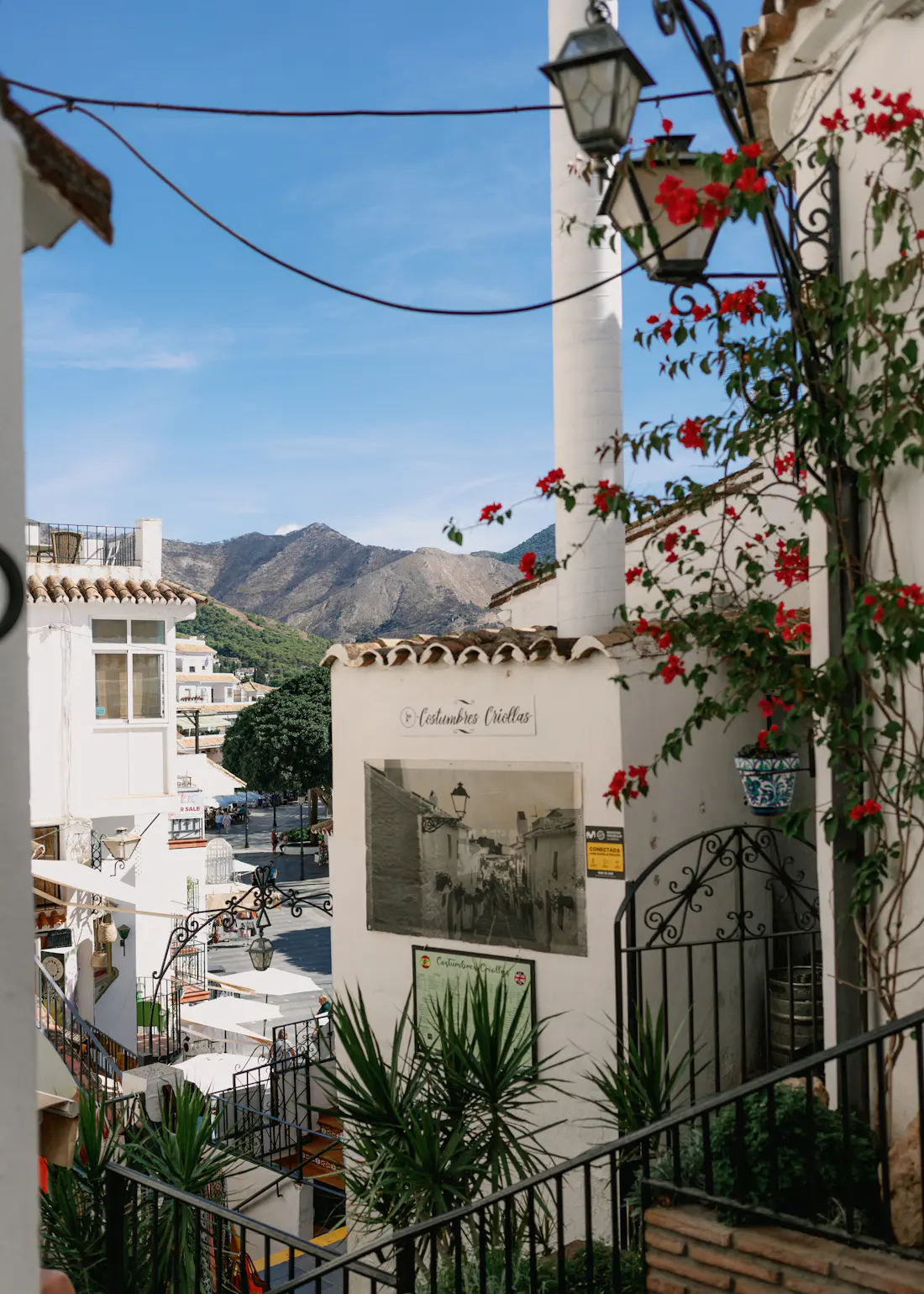 Whitewashed building with a clock in Mijas village
